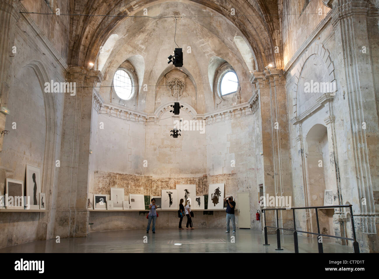 Gregoire Alexandre`s exhibition in the Church of the Trinitaires, during Les Rencontres d’Arles, France. Stock Photo